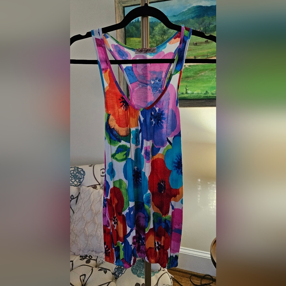 Floral Oversized Razorback Tank with Elastic at bottom to for Balloon effect.